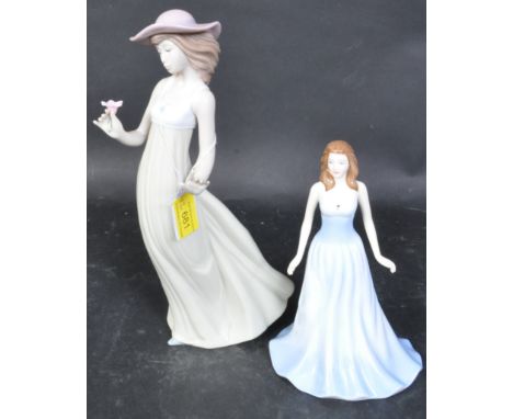 Two vintage 20th century ceramic figures to include a Spanish porcelain Lladro Nao figurine in the form of a girl holding out