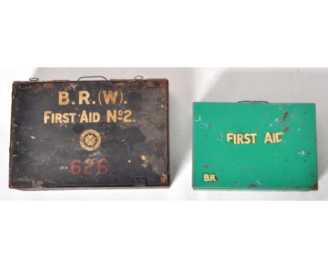 Two vintage British Railways First Aid Cabinet Boxes.  A black box that reads in white lettering B.R.(W). First Aid No. 2. Th