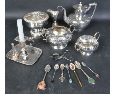 A collection of vintage 20th century silver plated items to included a three piece tea service with repousse floral decoratio