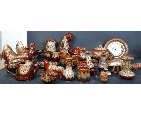 A large collection of vintage retro 20th century Fosters Cornish studio pottery table ware to include several egg holders in 