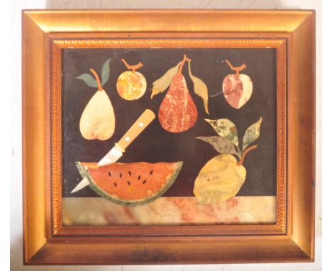 A vintage 20th Century&nbsp;pietra dura hardstone panel framed in an oak frame. Decorated with knifes cutting fruit. G. Ugoli