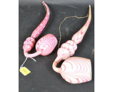 Two Victorian 19th century Nailsea ornamental glass pipe decorated with white &amp; candy pink swirls. Largest measures appro