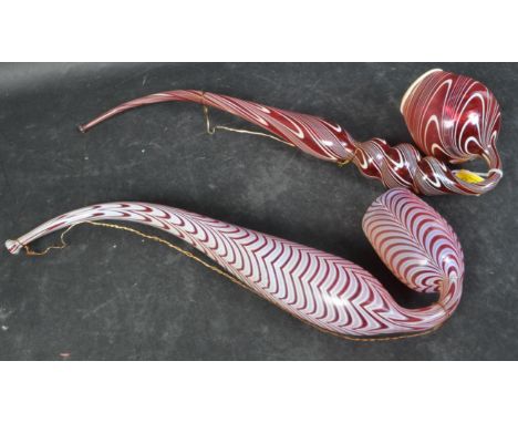 Two Victorian 19th century Nailsea ornamental glass pipe decorated with white &amp; cranberry pink swirls. Largest measures a