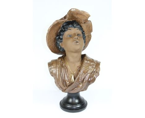 A painted Goldscheider style chalk bust of the whistling boy, H 46cm