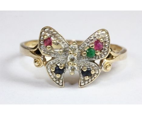 A 14ct gold ruby, emerald, sapphire and diamond butterfly ring (W)