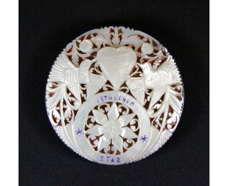 A .833 silver and carved mother of pearl compact