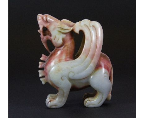 A fine mixed colour 19th/early 20th century Chinese jade figure of a winged dragon, H 10cm