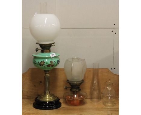 A Victorian brass and glass column oil lamp (64cm) a further oil lamp and 2 chimneys