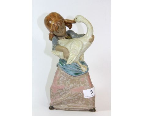 A Lladro terracotta figure of a girl with a goose, H 24cm (A/F)