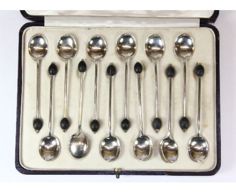 A cased set of 12 Asprey hallmarked silver coffee bean spoons Sheffield circa 1904
