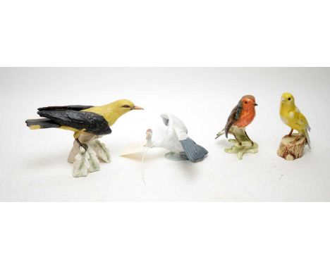 A selection of decorative ceramic bird figures, including: Goebel figure of a robin; Goebel figure of a canary bird; Goebel f