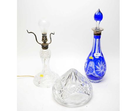 A silver collared clear and blue overlaid glass decanter, with stopper, maker P&amp;W, assay mark worn, 42cms high; together 