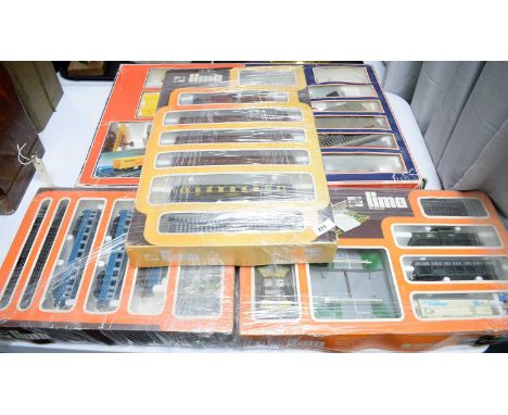 A selection of Lima model railway sets, including: three Lima H0 scale model sets, each in box; together with a Lima Trains C