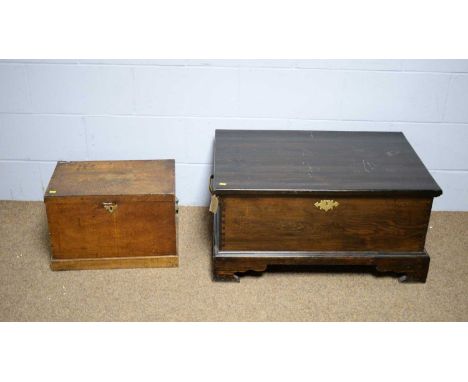 A vintage oak two-handled storage box, 48 x 30 x 33cms high; and a stained pine two-handled storage box, the rectangular top 