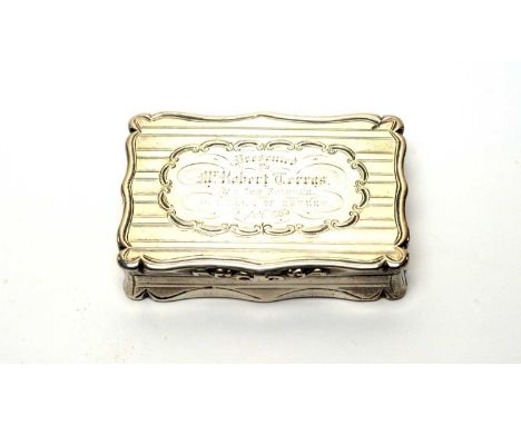 A silver snuff box, by Edward Smith, Birmingham 1860, engraved with presentation inscription. 