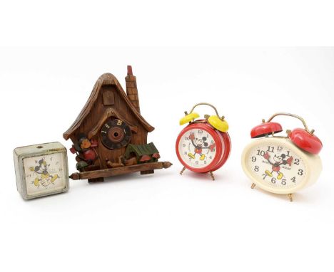Walt Disney's Mickey Mouse interests clocks, to include: a Black Forest type cuckoo clock; an Ingersoll bedside clock; two Av