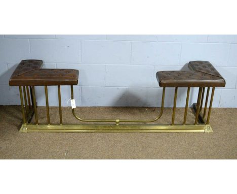 A Victorian-style brass and button upholstered club fender, 167 x 42 x 51cms high.