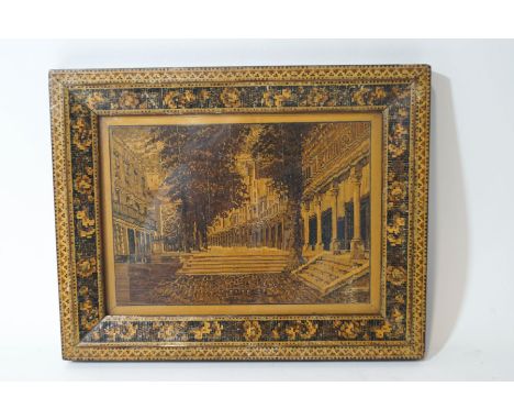 A Tunbridgeware panel depicting The Pantiles, with floral bordered frame, 19cm x 24.5cm