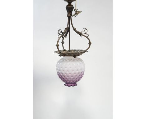 A Victorian pierced brass hanging light, with strawberry pattern glass shade, 84cm high