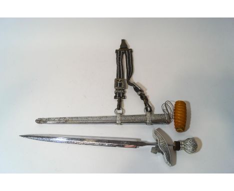 A WWII German Airforce dress dagger, the blade stamped S.M.F. Solingen, with scabbard