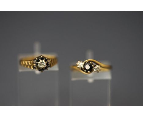 A 9 carat gold sapphire and illusion set diamond three stone ring; with a similarly set cluster ring; 3.5 g gross