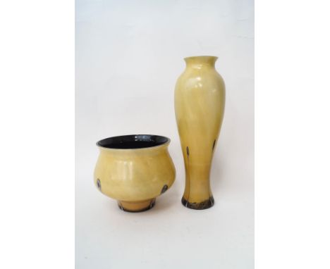 A Caithness Studio glass vase of tapering form, black trailing decoration over a mottled yellow ground,  31cm high, with labe