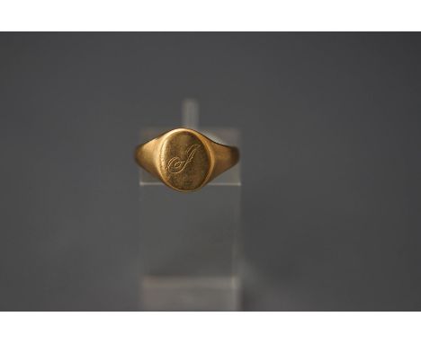 A 9 carat gold signet ring, finger size O,  2 g gross