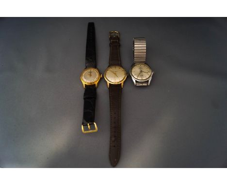 Three wristwatches, comprising : Eterna, Eternamatic, a gentleman's gold-plated and stainless steel wrist watch, silvered dia