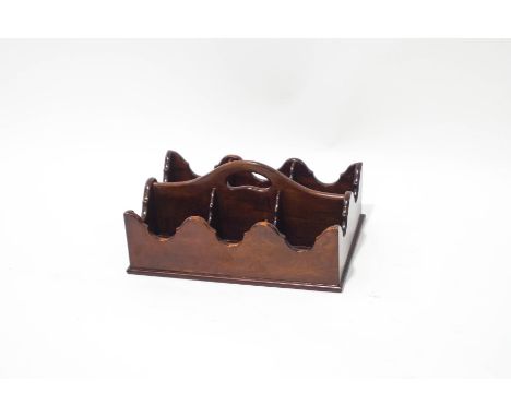 A mahogany six division decanter tray with shaped sides, 39cm x 27cm