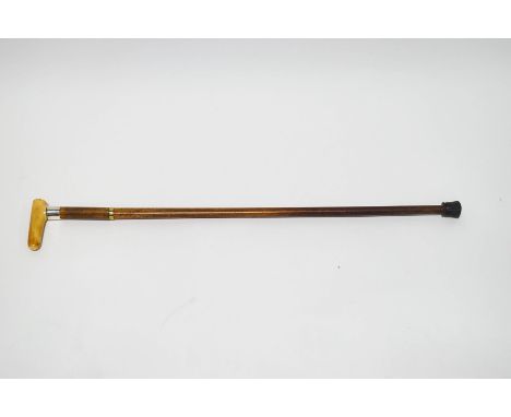 A walking stick with ivory handle and 1" wide silver collar (London 1908)