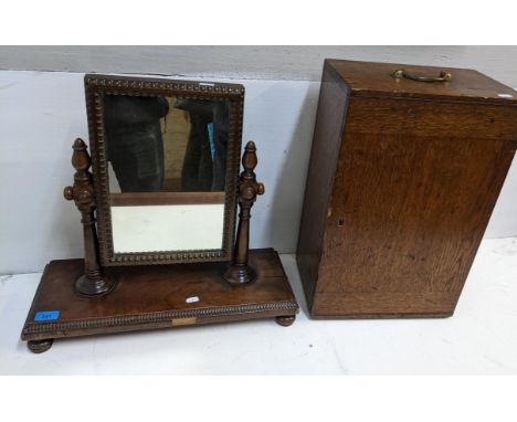 A 19th century mahogany dressing table swing mirror having a beaded border and turned feet, 47cm h x 50cm w, together with an