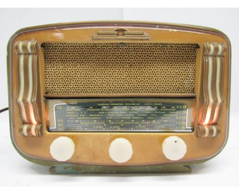 A vintage French valve radio with decorative light-up columns to front