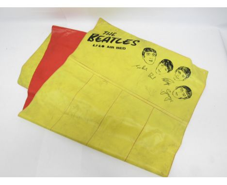 THE BEATLES: An officially licensed Beatles inflatable Li-Lo Air Bed, manufactured in 1964 by P.B. Cow, in yellow and red wit