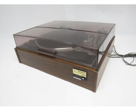 Hi-fi - A Sony PS 230 turntable, raised on teak effect base with smoked perspex lid