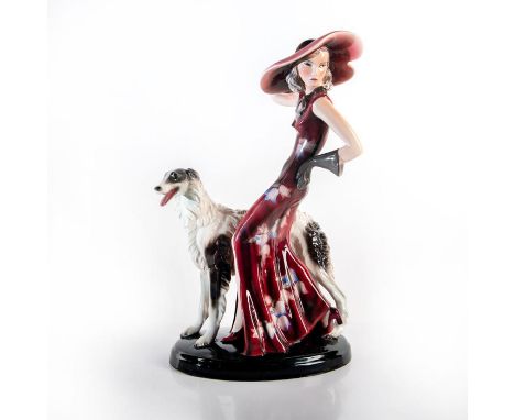 Art Deco figure of a woman in summer hat and dress walking a beautiful borzoi. Dress lavishly painted in burgundy and reds wi