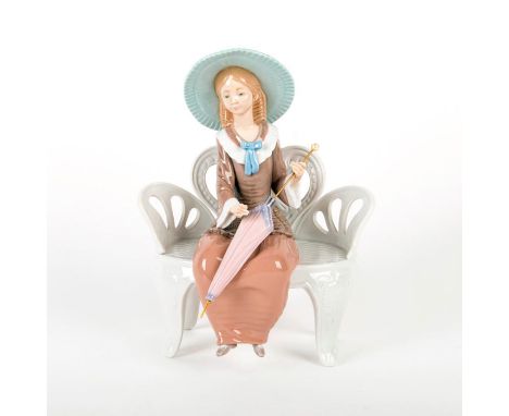 Woman dressed nicely, holding umbrella. Sitting on white bench. With original box. Lladro backstamp. Artist: Francisco Catala