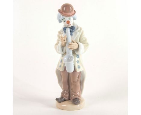 A sad clown stands taking a breath between playing his saxophone. No box Issued: 1988Dimensions: 8.75"H x 2.75"WManufacturer: