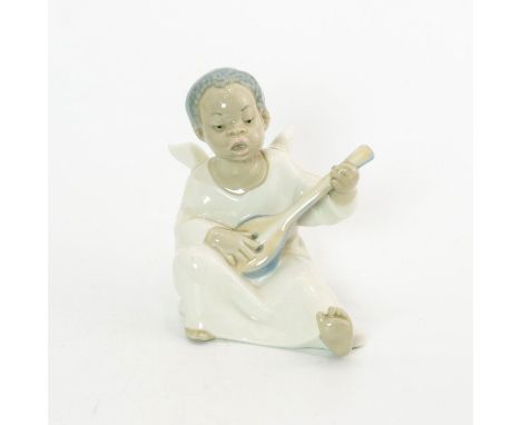 An angel sits singing and playing his mandolin. No box. Issued: 1970Dimensions: 4.75"H x 4.75"WManufacturer: LladroCountry of