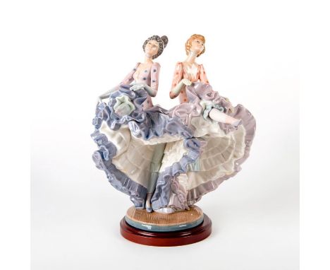 Glazed; Two women in beautiful dresses, doing the can-can!With original box. Lladro backstamp. Artist: Salvador DebonIssued: 