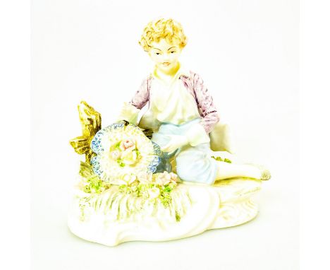 Hand painted porcelain of a boy in purple, white and blue; Sitting with flowers near fence. Unidentified black crossed arrow 