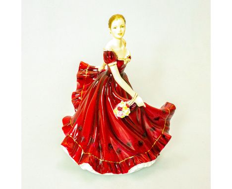 Glossy porcelain figurine of Sophie in her flowing ruby dress ornamented with gold gilt. Exquisite hand decorated detail. Dou