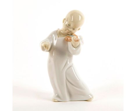 Glazed Chinese angel playing violin. No Box. Issued: 1969/2004Dimensions: 6"H x 3.25"WManufacturer: LladroCountry of Origin: 