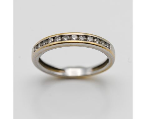 A diamond half eternity ring (not hallmarked), size K.