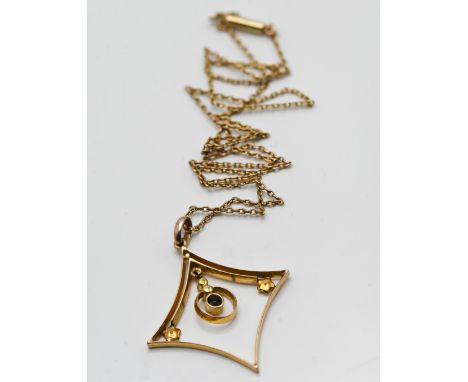 A gold pearl pendant set with a blue gemstone on a fine gold chain (not hallmarked).