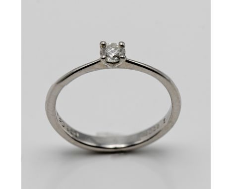 A diamond single stone ring set in platinum, size K/L.