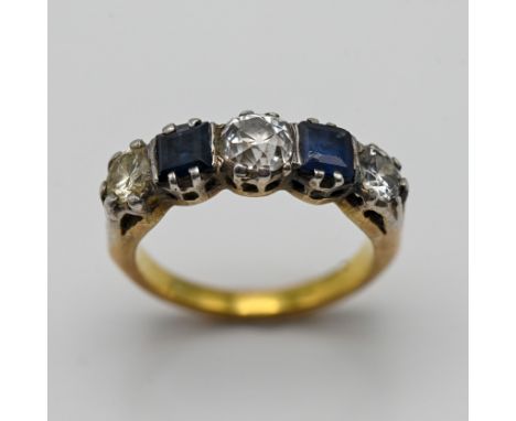 A yellow metal five stone gem set ring, size K