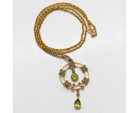 A 9ct gold peridot and pearl pendant on a fine 9ct gold chain.