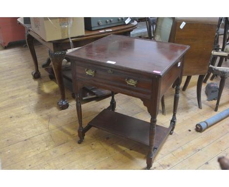 An Edwardian mahogany tray top side table, the rectangular top over a frieze drawer, raised on ring-turned legs joined by a s