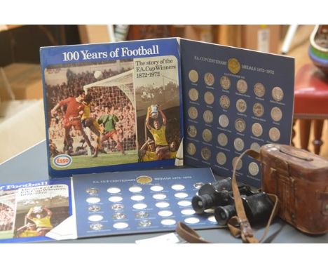 Two incomplete sets of replica FA Cup medals, commemorating the FA Cup Centenary 1872-1972; together with a pair of cased bin