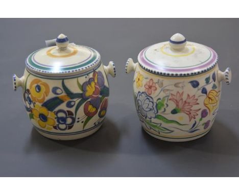 Two vintage Poole Pottery biscuit barrels and a spherical opaque glass light shade. (3) First 14cm